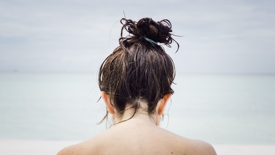 Avoid tying hair too tight: Tying or braiding your hair tightly will pull hair follicle and lead to hair loss.(Unsplash)