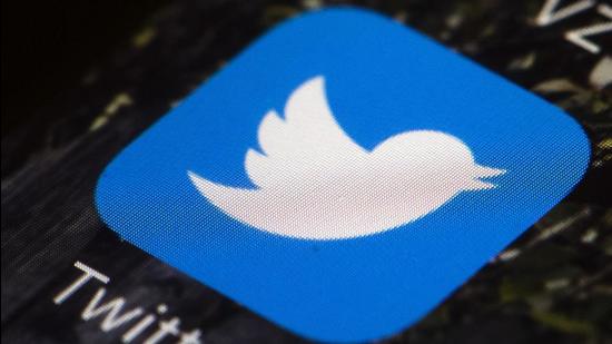 This file photo shows the Twitter app icon on a mobile phone.(AP Photo/Matt Rourke)