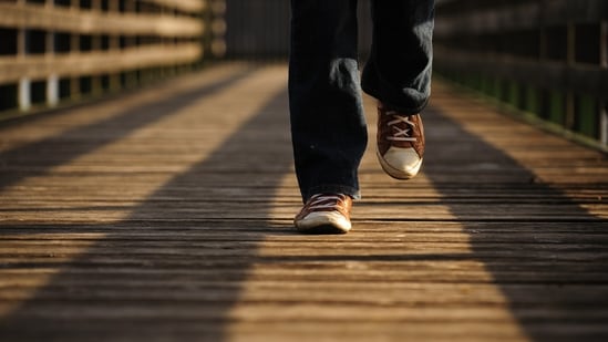 Walking: This not only helps lose belly fat but is an overall body workout that helps you stay fit. Shed that extra weight around your tummy by walking for at least 30 minutes every day and maintaining a healthy diet.(Unsplash)