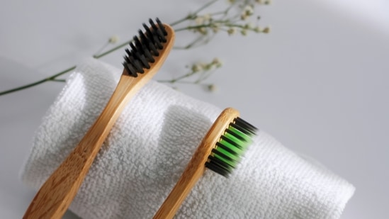 Exfoliate with a toothbrush: Wet your lips with some water and brush it with a soft bristles toothbrush twice a week. This will help get rid of any dead skin and leave your lips soft.(Unsplash)