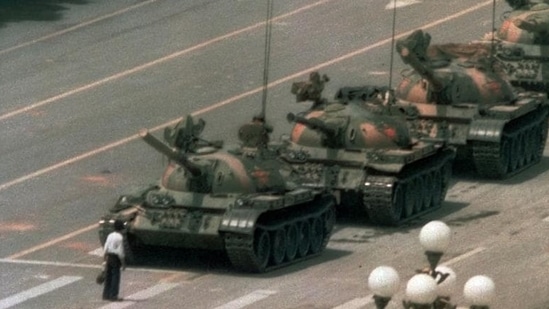 Unidentified Chinese man, popularly known as Tank Man, stood in front of a column of tanks leaving Tiananmen Square (AP). Unidentified Chinese man, popularly known as Tank Man, stood in front of a column of tanks leaving Tiananmen Square (AP).
