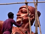 Artist retouch with colour to Chattrapati Shivaji Maharaj's statue(Anshuman Poyrekar/Hindustan Times) Artist retouch with colour to Chattrapati Shivaji Maharaj's statue(Anshuman Poyrekar/Hindustan Times)