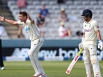 Tim Southee (left) and Rory Burns in action during the 1st Test.