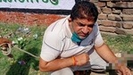 Aligarh hooch tragedy accused Rishi Sharma in police custody.(HT Photo) Aligarh hooch tragedy accused Rishi Sharma in police custody.(HT Photo)