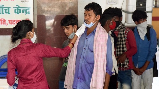 Travellers being tested for Covid-19 at Patna Railway Junction on June 5. As many as 36,47,46,522 samples have been tested in the country up to June 5 including 20,36,311 samples tested on June 5 itself, the Indian Council of Medical Research dashboard showed. (Santosh Kumar / HT Photo)