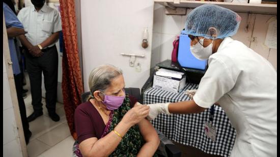 A senior citizen takes the Covid jab at the PMCs Ramabai Bhimrao Ambedkar hospital at Vijaynagar colony in Pune. (HT PHOTO) A senior citizen takes the Covid jab at the PMCs Ramabai Bhimrao Ambedkar hospital at Vijaynagar colony in Pune. (HT PHOTO)