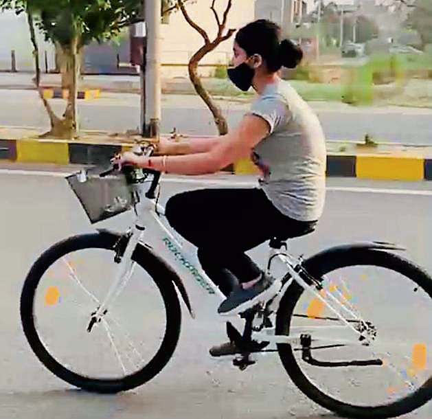 Suhavi Sharma cycling near her house in Ludhiana (HT Photo) Suhavi Sharma cycling near her house in Ludhiana (HT Photo)