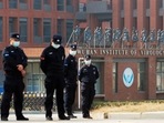 Security personnel outside Wuhan Institute of Virology during the visit by the World Health Organization (WHO) team, in Wuhan, Hubei province, China. 