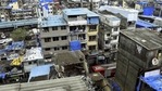 Rescue and relief work underway after a portion of a four-storey building collapsed on another house, at Rajjak Chawl in Kherwadi, Bandra (east) in Mumbai, Monday, June 7, 2021. (PTI) Rescue and relief work underway after a portion of a four-storey building collapsed on another house, at Rajjak Chawl in Kherwadi, Bandra (east) in Mumbai, Monday, June 7, 2021. (PTI)