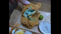 The image shows the deep fried towel delivered instead of the fried chicken.