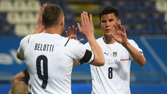 Andrea Belotti celebrates scoring their fourth goal with Matteo Pessina(REUTERS)