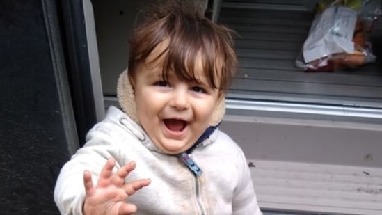 The 18-month old Iranian migrant boy Artin Irannezhad reacts, in Dunkirk, France, October 17, 2020, in this handout picture obtained by Reuters June 7, 2021. Bruno Libbrecht/Allemaal Mensen/Handout via REUTERS (via REUTERS)
