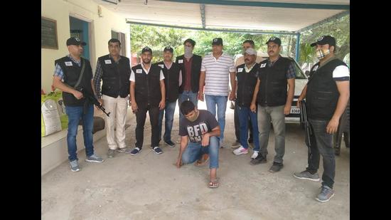 Neeraj, alias Gandhi, in the custody of Ambala police on Monday. (HT Photo)