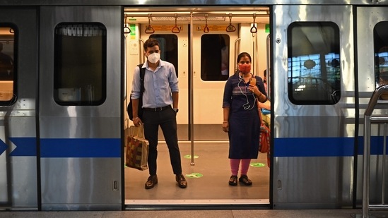 Commuters travelling in a metro coach at a station after the services were allowed to operate in New Delhi on June 7. The Delhi Metro’s services had been suspended on May 10. (Money Sharma / AFP) Commuters travelling in a metro coach at a station after the services were allowed to operate in New Delhi on June 7. The Delhi Metro’s services had been suspended on May 10. (Money Sharma / AFP)