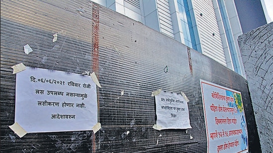 Notices of non-availability of vaccine put up at a Covid vaccination centre in Pune, on Sunday. (RAVINDRA JOSHI/HT)