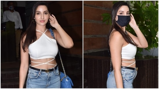 Nora Fatehi pairs crop top and denims with <span class='webrupee'>?</span>4 lakh bag on day out, see pics(Varinder Chawla)