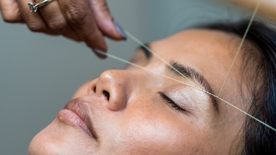 Shape your eyebrows: The most tricky one is shaping your brows. The easiest way of getting those eyebrows groomed is by using a wax strip. Cut it into the desired shape, carefully place it on areas where there is unwanted hair and pull at once. You can also use peel offs if you have steady hands.(Unsplash)
