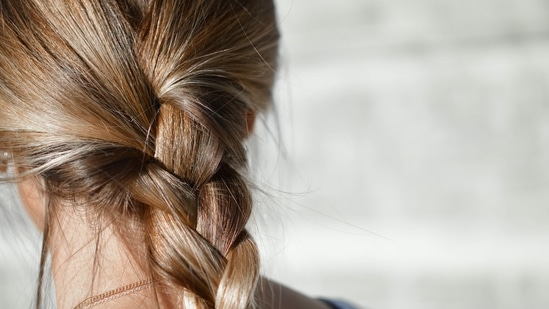 Apply hair mask: You can make a DIY mask or purchase one online and apply it every once a week on your hair and not your scalp. If you have colour treated hair then use it every twice a week.(Unsplash)