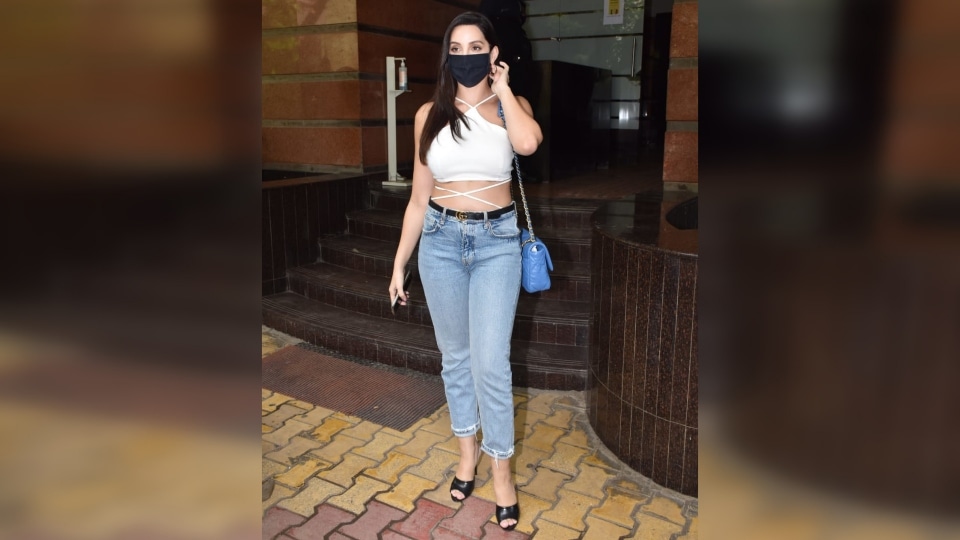 Nora Fatehi Carries Rs 7 Lakh Handbag At The Airport With Lace Bodice And  Denim