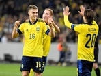 Sweden's Mattias Svanberg celebrates his 2-0 goal with Dejan Kulusevski and Kristoffer Olsson.