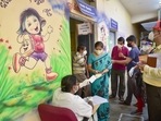Beneficiaries register for the Covid-19 vaccine dose at a vaccination centre in Bengaluru, Friday, May 28, 2021. (PTI) Beneficiaries register for the Covid-19 vaccine dose at a vaccination centre in Bengaluru, Friday, May 28, 2021. (PTI)