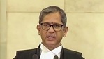 CJI NV Ramana also talked about her drawing showing a judge smashing the coronavirus with his gavel and also the tricolour, lion capital and smiling portrait of Mahatma Gandhi. (ANI Photo) CJI NV Ramana also talked about her drawing showing a judge smashing the coronavirus with his gavel and also the tricolour, lion capital and smiling portrait of Mahatma Gandhi. (ANI Photo)