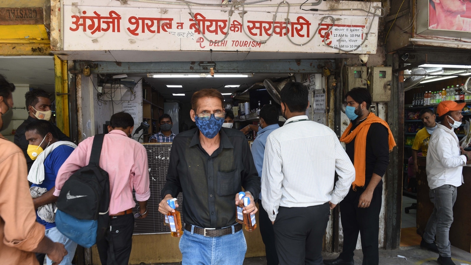 Now, marshals at Delhi liquor shops to ensure Covid-appropriate ...