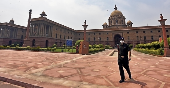 The CSS allows officers of the level of deputy secretary, deputy director and above to be appointed on central deputation in ministries of the central government or central government’s departments. In this file photo, A defence personnel wearing a facemask is seen outside the South Block in Raisina Hill, New Delhi. (Sonu Mehta)