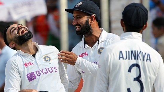 Indian skipper Virat Kohli and teammates Pujara and Rahane celebrate a dismissal during the fourth test match between India and England at Narendra Modi Stadium in Ahmedabad on Saturday. (ICC/ANI Photo)