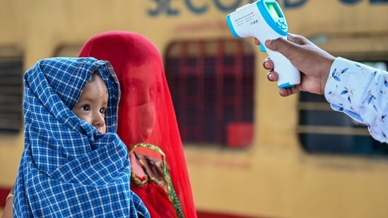 The western state recorded 10,219 cases on Monday, reporting a decrease from the 12,557 cases recorded on Sunday. (Photo by Punit PARANJPE / AFP) (AFP) The western state recorded 10,219 cases on Monday, reporting a decrease from the 12,557 cases recorded on Sunday. (Photo by Punit PARANJPE / AFP) (AFP)
