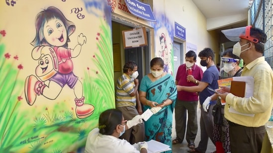 Beneficiaries register for the Covid-19 vaccine dose at a vaccination centre in Bengaluru, Friday, May 28, 2021. (PTI)