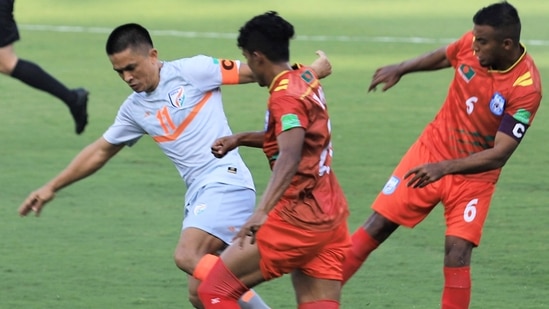 ndian football team captain Sunil Chhetri in action against Bangladeshi players during their World Cup qualifier match held in Qatar. (PTI) ndian football team captain Sunil Chhetri in action against Bangladeshi players during their World Cup qualifier match held in Qatar. (PTI)