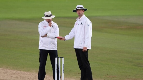 File Photo of Richard Illingworth and Michael Gough (right) officiating a Test match.(Getty Images)