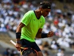 Spain's Rafael Nadal reacts as he plays against Argentina's Diego Schwartzman during their men's singles quarter-final tennis matcH. Spain's Rafael Nadal reacts as he plays against Argentina's Diego Schwartzman during their men's singles quarter-final tennis matcH.