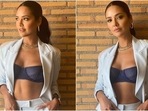 Esha Gupta in chic white pantsuit and blue bralette glams up the boss lady look(Instagram/@egupta) Esha Gupta in chic white pantsuit and blue bralette glams up the boss lady look(Instagram/@egupta)