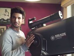 Sushant Singh Rajput poses with his telescope. Sushant Singh Rajput poses with his telescope.