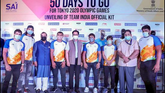 New Delhi: Minister of State for Youth Affairs & Sports, AYUSH (Independent Charge) and Minority Affairs, Kiren Rijiju at the unveiling ceremony of the Team India Official Olympic Kit, on the occasion of 50 Days Countdown to Tokyo Olympics, in New Delhi, June 3, 2021. (PTI Photo/PIB)(PTI06_03_2021_000199A) (PTI) New Delhi: Minister of State for Youth Affairs & Sports, AYUSH (Independent Charge) and Minority Affairs, Kiren Rijiju at the unveiling ceremony of the Team India Official Olympic Kit, on the occasion of 50 Days Countdown to Tokyo Olympics, in New Delhi, June 3, 2021. (PTI Photo/PIB)(PTI06_03_2021_000199A) (PTI)