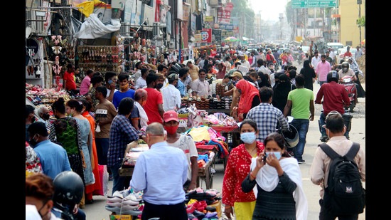 A huge crowd of people is seen after the unlocking resumes, at Aminabad Market in Lucknow on Wednesday. (ANI) A huge crowd of people is seen after the unlocking resumes, at Aminabad Market in Lucknow on Wednesday. (ANI)