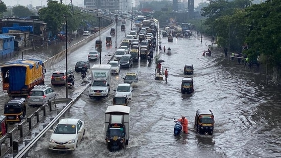 In Pics Mumbai Wakes Up To Heavy Rains As Monsoon Reaches Maharashtra