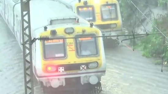 Railway tracks submerged on the central line in Mumbai. (ANI Photo) Railway tracks submerged on the central line in Mumbai. (ANI Photo)