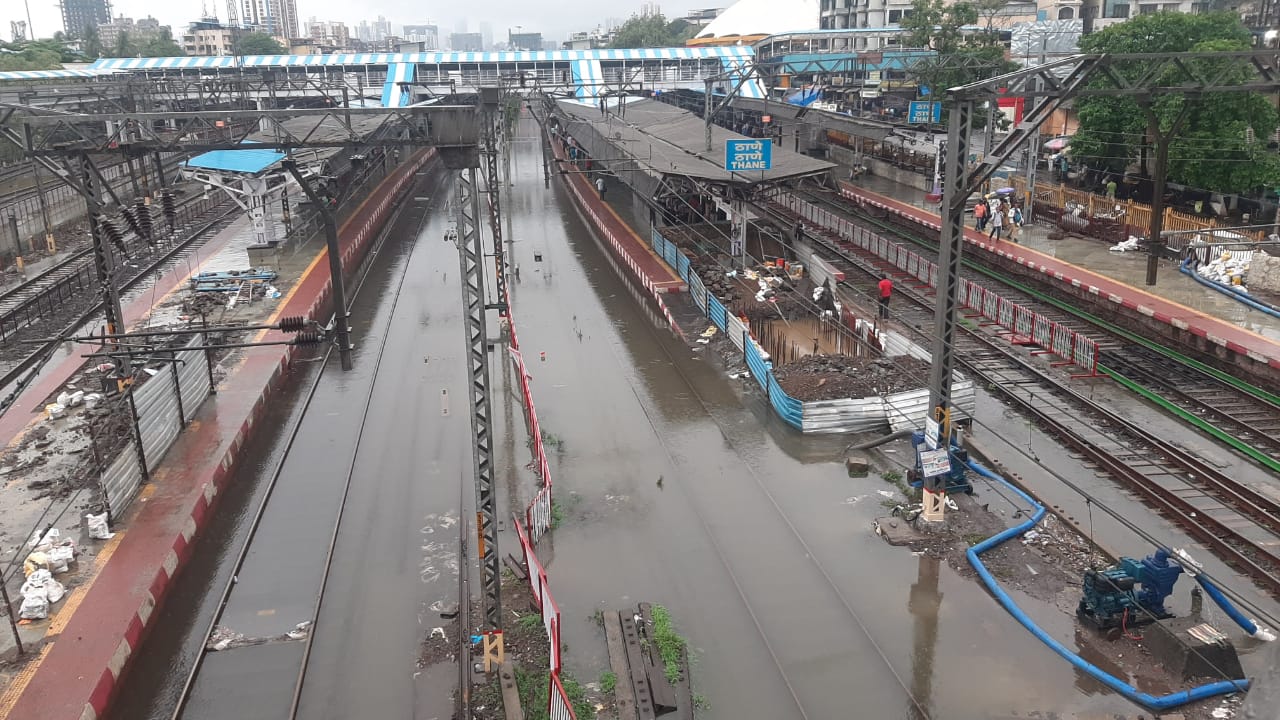 Waterlogging seen on the railway tracks at Thane railway station on Wednesday. (Photo: Praful Gangurde/ HT) Waterlogging seen on the railway tracks at Thane railway station on Wednesday. (Photo: Praful Gangurde/ HT)