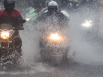 indiaCommuters make their way through the waterlogged road during heavy rain, at Kings Circle, in Mumbai, on June 9 (PTI) indiaCommuters make their way through the waterlogged road during heavy rain, at Kings Circle, in Mumbai, on June 9 (PTI)
