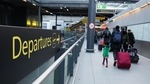 Passengers pull luggage after disembarking an inter-terminal train at London Gatwick Airport Ltd. in Crawley on December 19. Germany, the Netherlands, Belgium, Austria and Italy all announced restrictions on UK travel, hours after Britain announced its latest stay at home orders. (Chris Ratcliffe / Bloomberg) Passengers pull luggage after disembarking an inter-terminal train at London Gatwick Airport Ltd. in Crawley on December 19. Germany, the Netherlands, Belgium, Austria and Italy all announced restrictions on UK travel, hours after Britain announced its latest stay at home orders. (Chris Ratcliffe / Bloomberg)