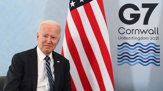 “We’re going to help lead the world out of this pandemic working alongside our global partners," Joe Biden said. (Reuters)