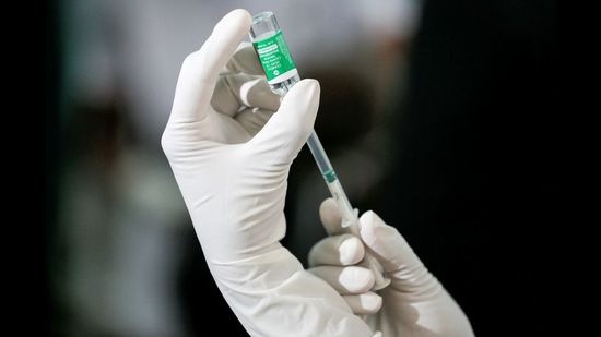 A health official draws a dose of AstraZeneca's COVID-19 vaccine manufactured by the Serum Institute of India, January 29, 2021. (REUTERS)