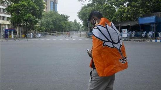 A BJP supporter on the election result day of the West Bengal Assembly election, Kolkata, 2021 (ANI) A BJP supporter on the election result day of the West Bengal Assembly election, Kolkata, 2021 (ANI)