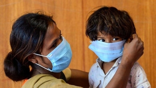 Children aged between six to 11 years may wear a mask, but only the supervision of parents and the consulting doctor, the guidelines stated. (File Photo / PTI)