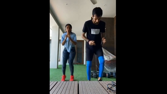 The image shows Yuzvendra Chahal and Dhanashree Verma engaged in an intense workout session.(Instagram/@yuzi_chahal23)
