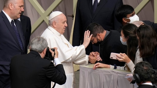 Pope Francis blesses and attendee as he arrives for his weekly general audience, at the Vatican,(AP) Pope Francis blesses and attendee as he arrives for his weekly general audience, at the Vatican,(AP)