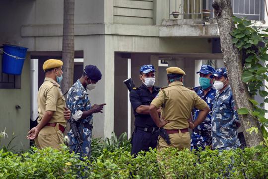 Security personnel stand vigil after a shootout yesterday at the apartment complex at New Town, on the outskirts of Kolkata on Thursday (PTI) Security personnel stand vigil after a shootout yesterday at the apartment complex at New Town, on the outskirts of Kolkata on Thursday (PTI)